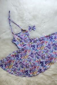 Image 2 of Lisa Frank haiter dress.