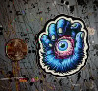 Image 1 of 'Eyeball Hand' Monster Sticker