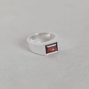 Image of Fire Red Garnet rectangle cut wide band silver ring