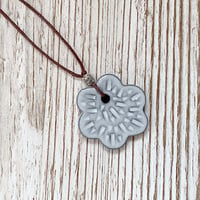 Image 1 of Black Clay White Flower Pendant/Necklace