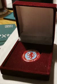 Image 1 of 150th anniversary medal in claret and blue