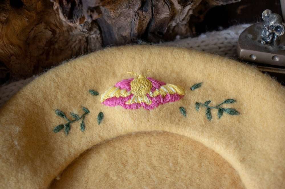 Image of Rosy Maple Moth Beret