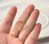 Image 2 of Tiny Star Flower Earrings