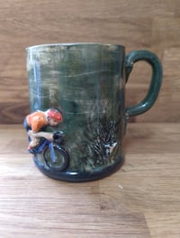 Image 1 of Cycling mug with hills and a badger (made to order)