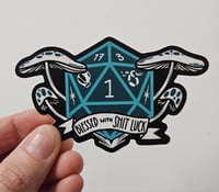 Image 2 of D20 "blessed with shit luck" sticker (standard & holo)