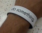 Image of IAO1 "do something" wristband