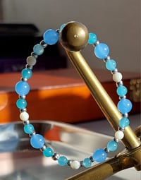 Cyan Malaysian Jade, blue Agate and Mother of Pearl bracelet.