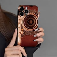 Image 1 of Brown Camera Pattern