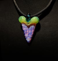 Image 1 of CFL reactive mixed color shark tooth pendant with green slyme top and blue stardust bale.