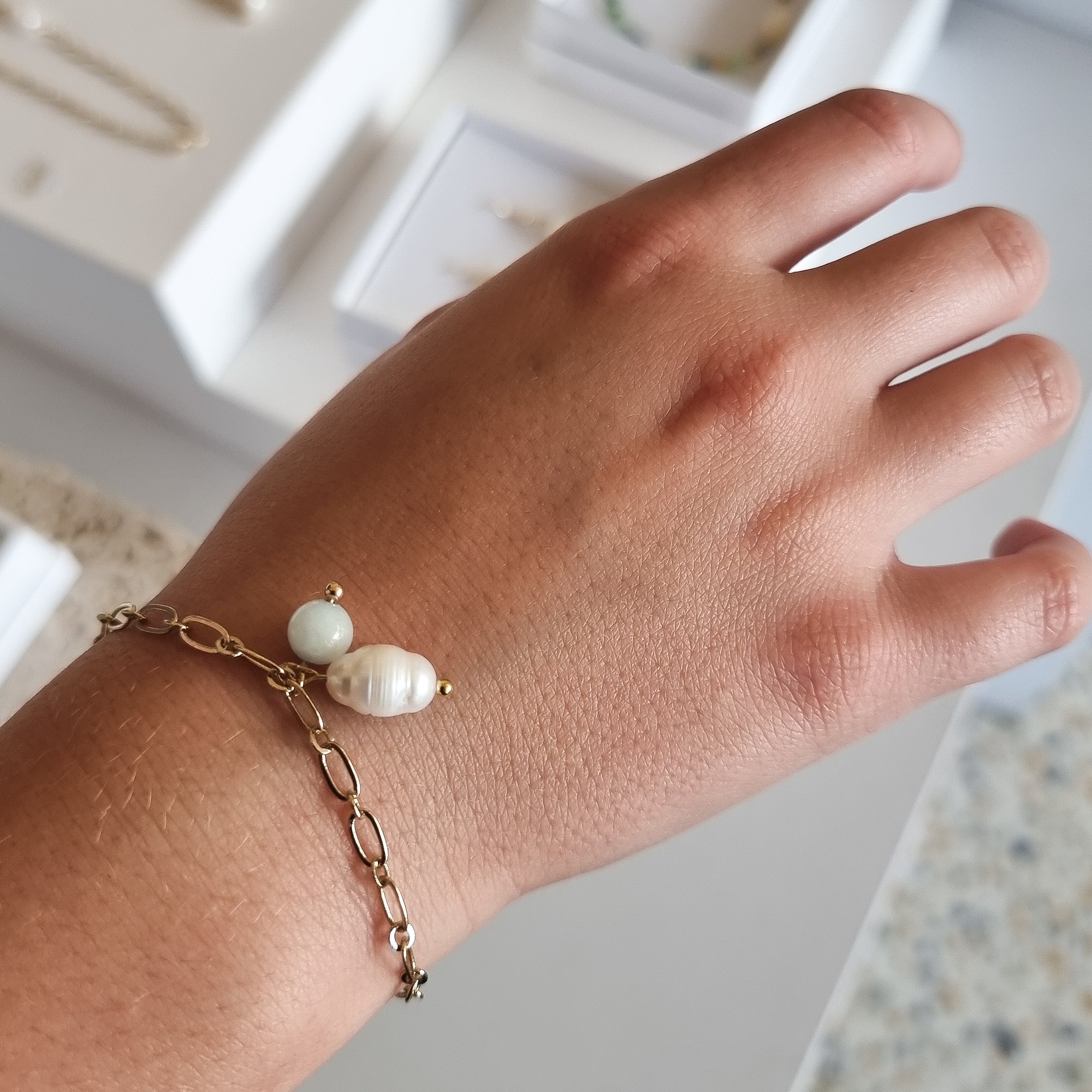 Image of Freshwater pearl bracelet with blue glass stone