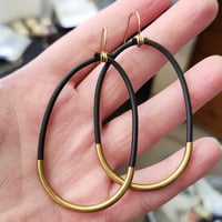 Image 1 of Black Rubber