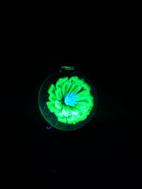 Image 2 of UV reactive glow flower pendant backed in blue stardust 💎🟢🌻