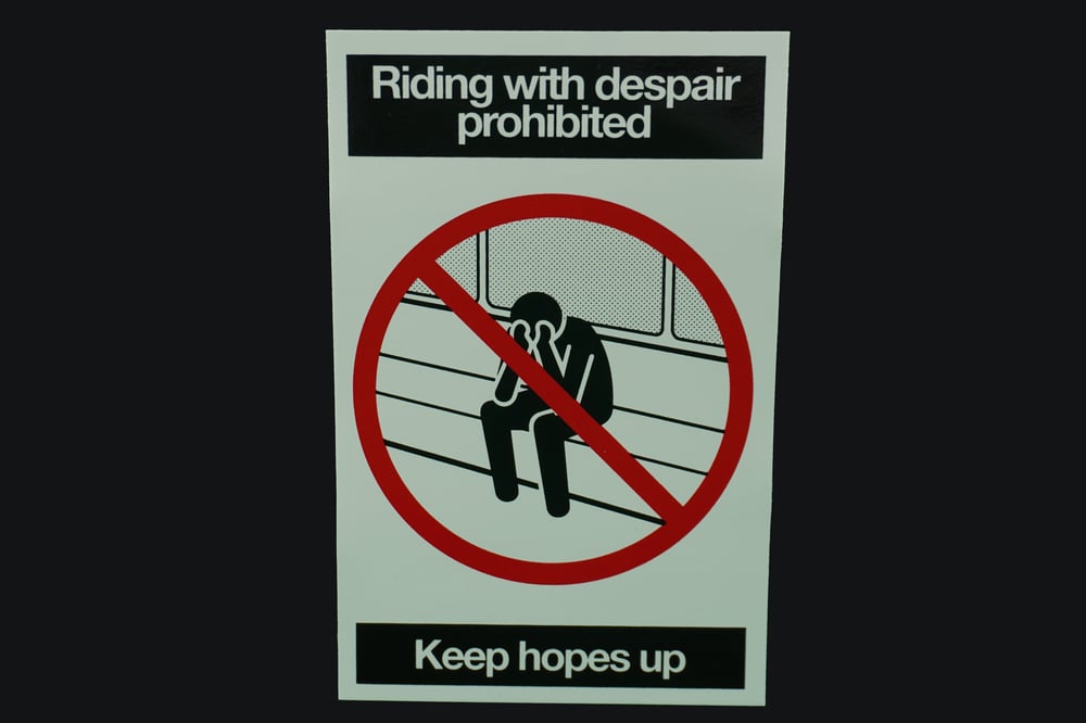 "Riding With Despair Prohibited Keep Hopes Up" Sticker