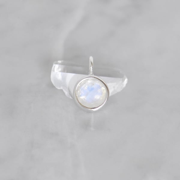 Image of Rainbow Moonstone round star cut silver necklace