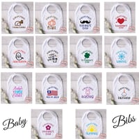 Image 1 of BABY'S FIRSTS BIBS