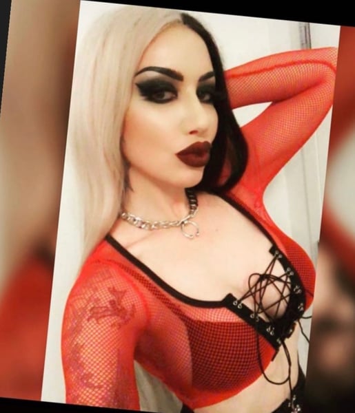 Ash Costello: Leather Corset Outfit