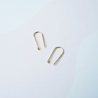 Image 4 of Small Arc Earrings in Gold