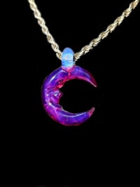 Crescent moon pendant made with royal jelly & moonstone.