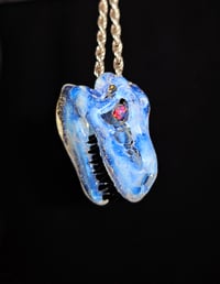 Image 1 of Secret white T-Rex skull pendant with 4mm opal sphere eyes