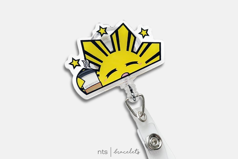 Image of LIMITED EDTION SUN WITH COFFEE BADGE REEL
