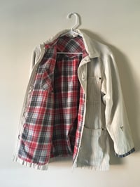 Image of Cream, floral, and flannel field coat
