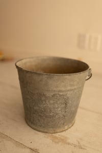 gray metal bucket