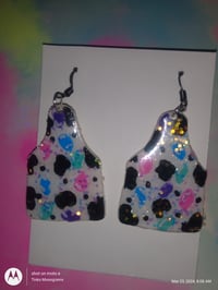 Cowtag with cow print earrings