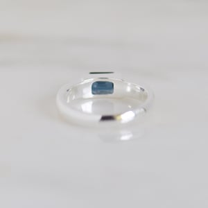Image of Tanzania Bluish Green Sapphire bevel cut round band silver ring