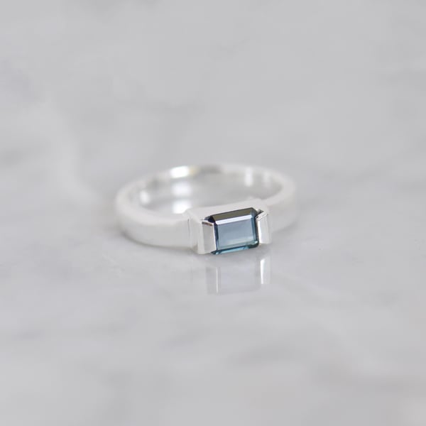 Image of Tanzania Bluish Green Sapphire bevel cut round band silver ring