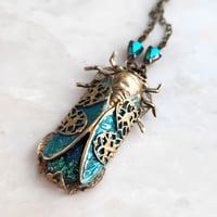 Image 4 of Cicada Necklace in Brass with Czech Glass Green Opal - Art Deco Insect Jewelry