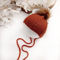 Image 1 of  Newborn  photoshooting knitted hat | with pompom | rusty red