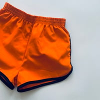 Image 1 of Orange shorts size 5-6 years 