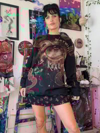 Image 3 of “NOTHING IS REAL” CUSTOM BLEACH PAINTED SWEATER LARGE