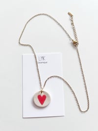 Collier pendentif rond céramique cœur