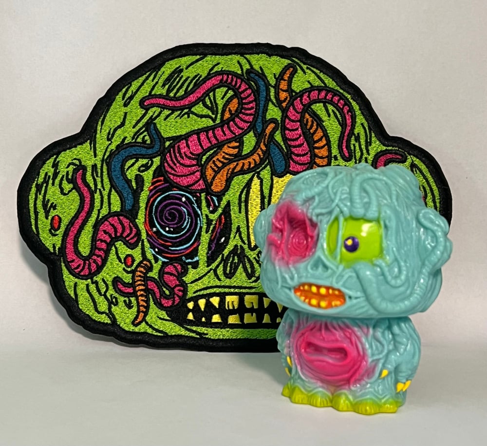 Zom vinyl figure and embroidered patch