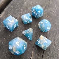 Image 2 of BLUE MARBLE POLYHEDRAL DICE SET semi-opaque base with gold flake inclusions