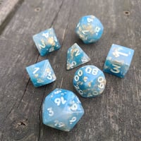 Image 3 of BLUE MARBLE POLYHEDRAL DICE SET semi-opaque base with gold flake inclusions