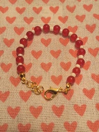 red and white bracelet