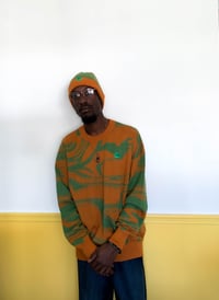 Image 1 of Awkward Orange Sweater