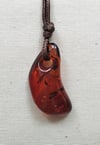  Reddish Amber pendant with cord