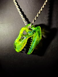 Image 3 of Yellow opal layered with blue stardust T-Rex pendant. 