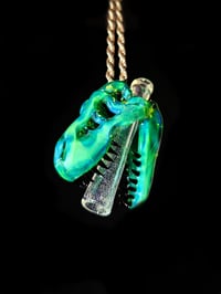 Image 4 of Titan V4 T-Rex skull pendant with galaxy teeth & a green dichro joint tip. 