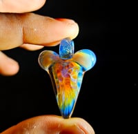 Image 1 of Shark tooth pendant with silver fumed bottom and mirage (CFL) top & dichro bale.