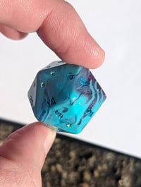 Image 1 of Turquoise Swirl Lucky Star 22mm D20 Single