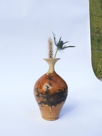 small curved vase