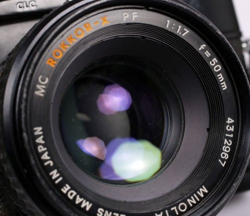 Image of Minolta BLACK SRT-100 35mm SLR Film Camera + 50mm F1.7 lens + REFLX METER #9321