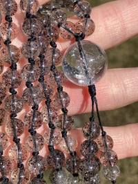 Image 1 of Biotite Mica in Crystal Quartz Mala Necklace, Black Strawberry Quartz 108 Bead Hand Knotted Gemstone