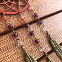 Image 2 of Decorative Red Wooden Mandala Hanger with Purple Czech Glass Beads and Bronze Feathers