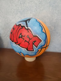 Image of Custom airbrush basketball with graffiti name and jump man graphic