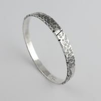 Image 1 of NOTCHED Hammered Bangle